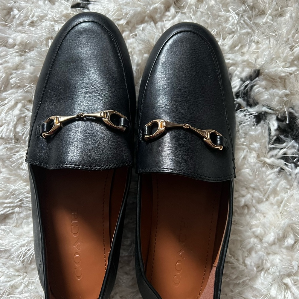 Coach Black Leather Slip-On Loafers with Gold Accents